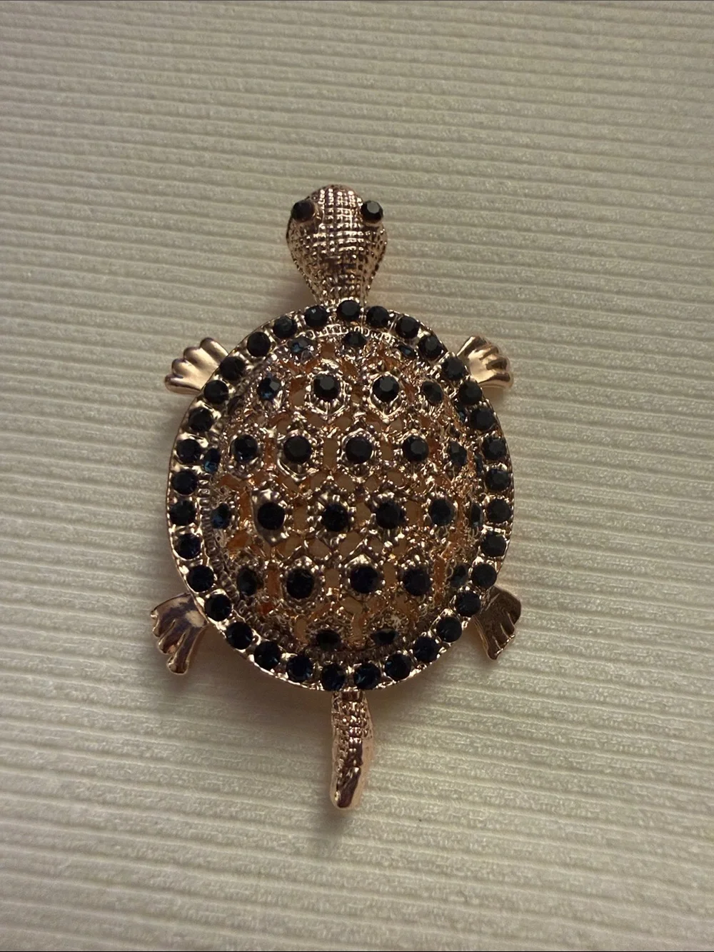 Gold-Tone Turtle Brooch with Black Crystal Accents